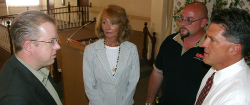 Stephan Wingert, left, talks to Councilwoman Rita Vogler, Hesperia Chamber of Commerce Vice-President Eric Schroder and Hesperia City Manager Mike Podegracz